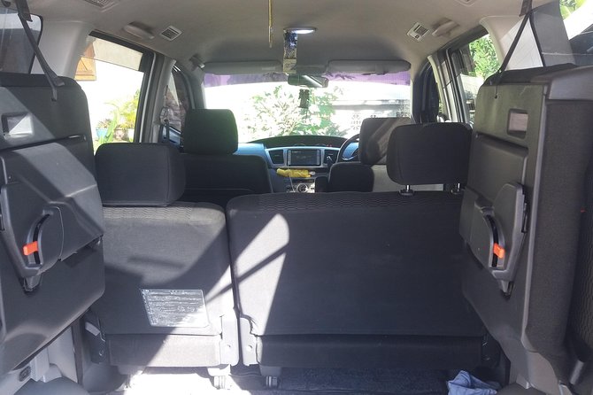 Airport Round-trip Transfer St. Lucia - Inside the Ride: Water, Drinks, and Music on Your Terms
