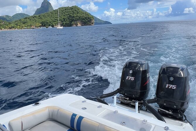 Private Boat Charter St. Lucia, boat tour to Soufriere. Full day - Anse Chastanet Beach and Reef: finishing with black sand and a calm marine feel