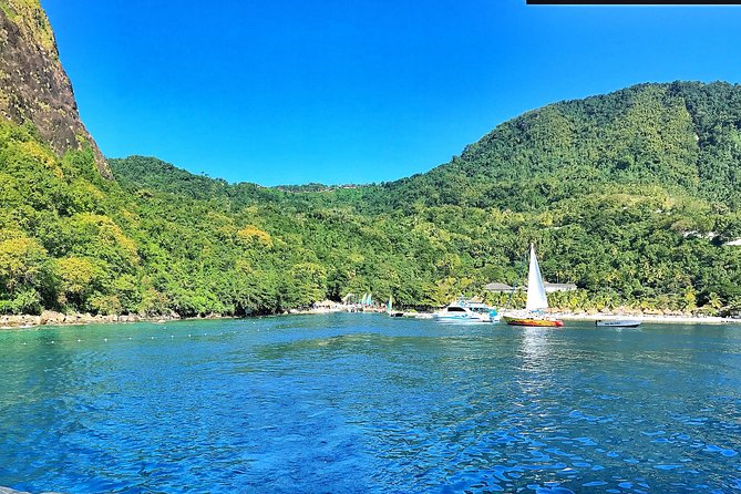 Private Custom Coastal Cruise St. Lucia Full Day - Soufriere waterfall and volcano time, plus a Marigot Bay cocktail