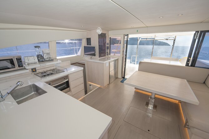 Private Half-Day Luxury Catamaran Experience - The beach stop for swimming and snorkel time