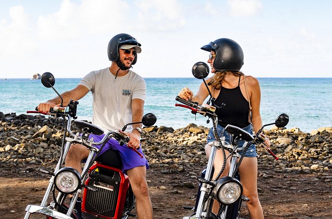 St.Lucia Beaches and Backroads Tour by Electric Big-Wheel Scooter - Darren Sammy National Cricket Stadium: culture you feel at local pace