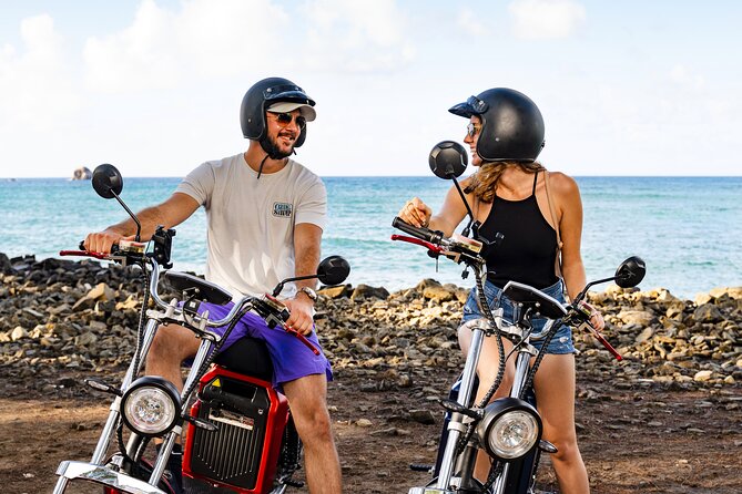 St.Lucia Beaches and Backroads Tour by Electric Big-Wheel Scooter - Pigeon Island National Landmark: Wooden Leg history by the water