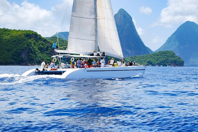 St Lucia Catamaran Day Sailing and Sightseeing Tour - Pickup to Marina: North Island Hotels and Timing Reality