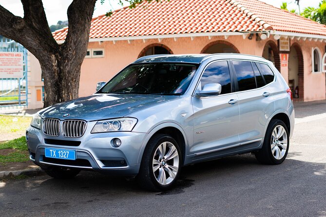 St. Lucia Private Airport Transfers - Air-Conditioned Comfort on the Road, BMW X3 or 14-Seater Bus