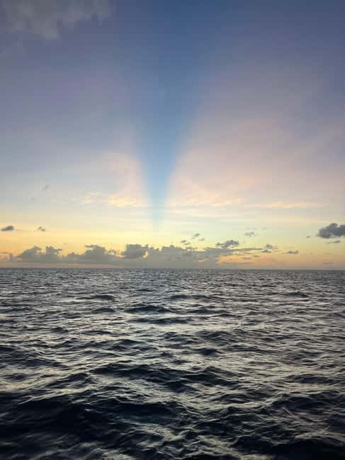 St. Lucia: Sunset Cruise, best way to end a day in paradise - Sunset from the deck: timing, views, and the rain reality