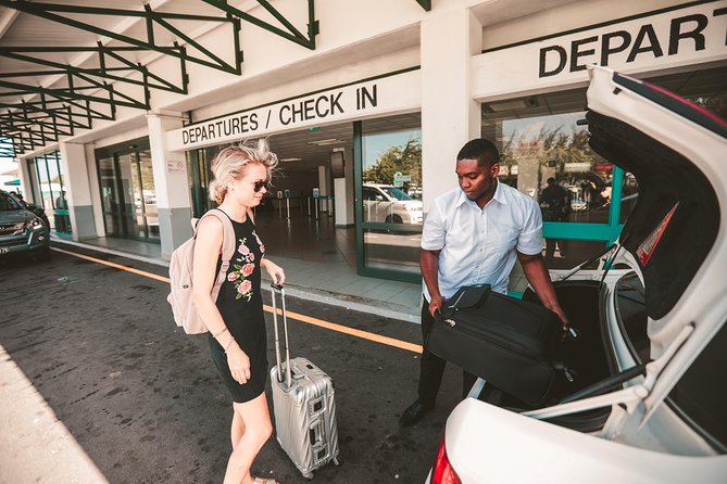 St. Lucia West Coast Airport Transfer - See The Pitons - West Coast Views: Pitons, Beaches, Rainforest, and Fishing Villages
