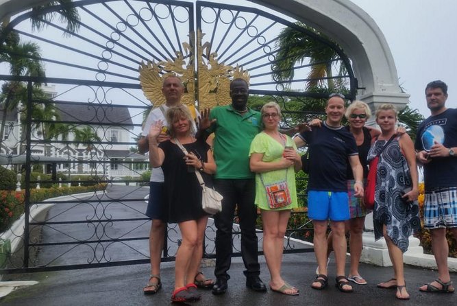 Trip to Soufiere: Volcano, Twin Pitons, Waterfall, Mud Bath & Botanical Garden - Diamond Falls Botanical Garden and waterfall, where cash helps